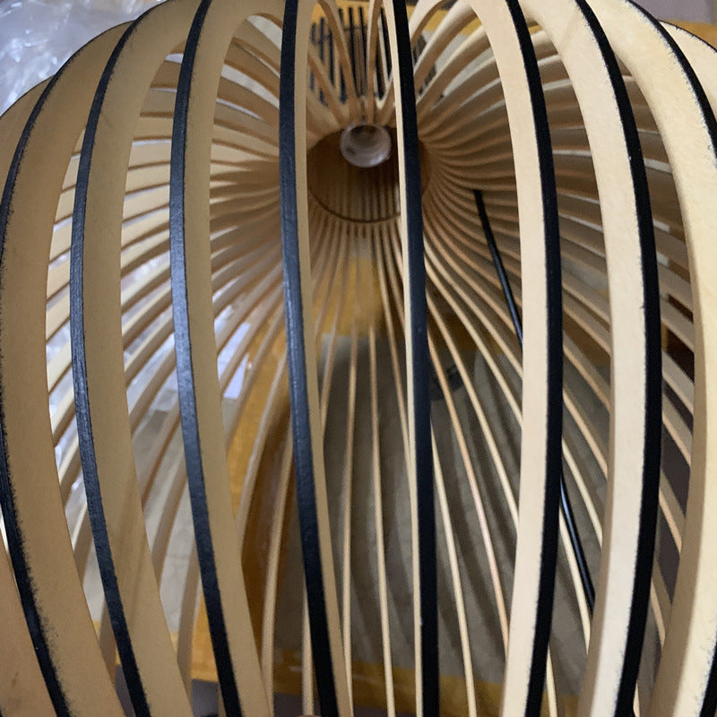 ÉcorceLumi™ – Éclairage Suspendu en Bois Sculpté