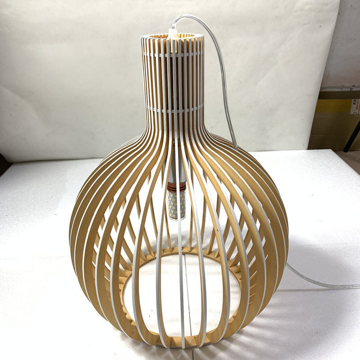 ÉcorceLumi™ – Éclairage Suspendu en Bois Sculpté