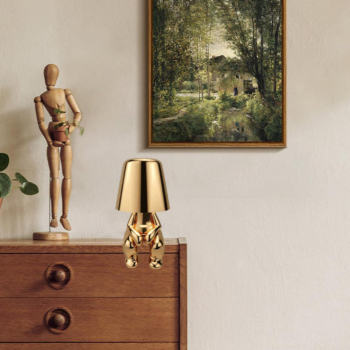 StatuLumi™ – Lampe LED Artistique avec Sculpture Dorée